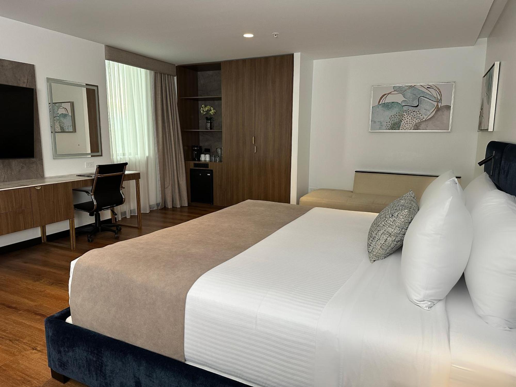 Wyndham Quito Airport Hotel Puembo Luaran gambar A room at the hotel