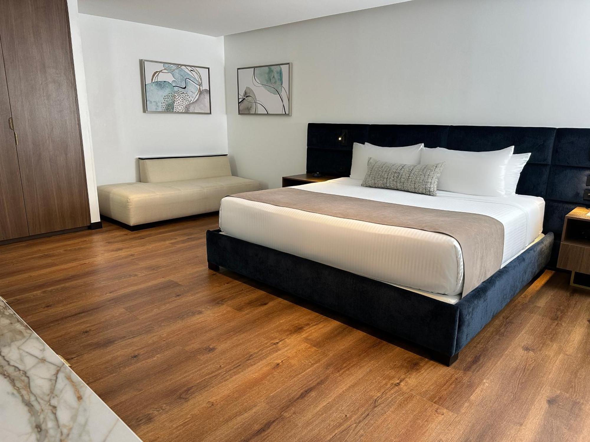 Wyndham Quito Airport Hotel Puembo Luaran gambar A bedroom at the hotel